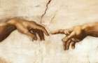 Close-up detail of "The Creation of Adam" from Michelangelo's Sistine Chapel frescoes.