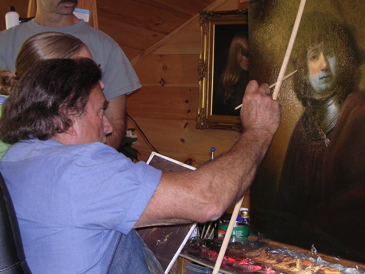 Artist Frank Covino working with a student during a workshop in his Vermont studio.