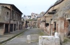 A street you can walk along when you visit the ruins of Herculaneum.