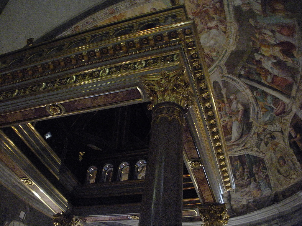 The raised tribune of the church, with frescoes by Giacomo Coppi.